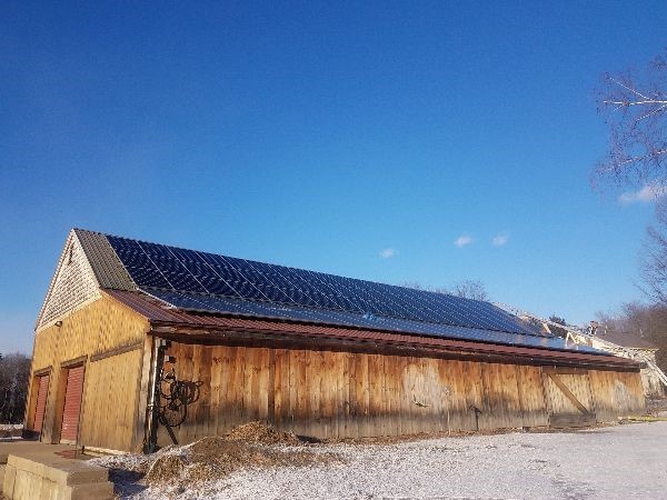 Roof mounted solar electric array at Mountain View Farm in Easthampton, a previous MDAR and REAP Grant recipient.